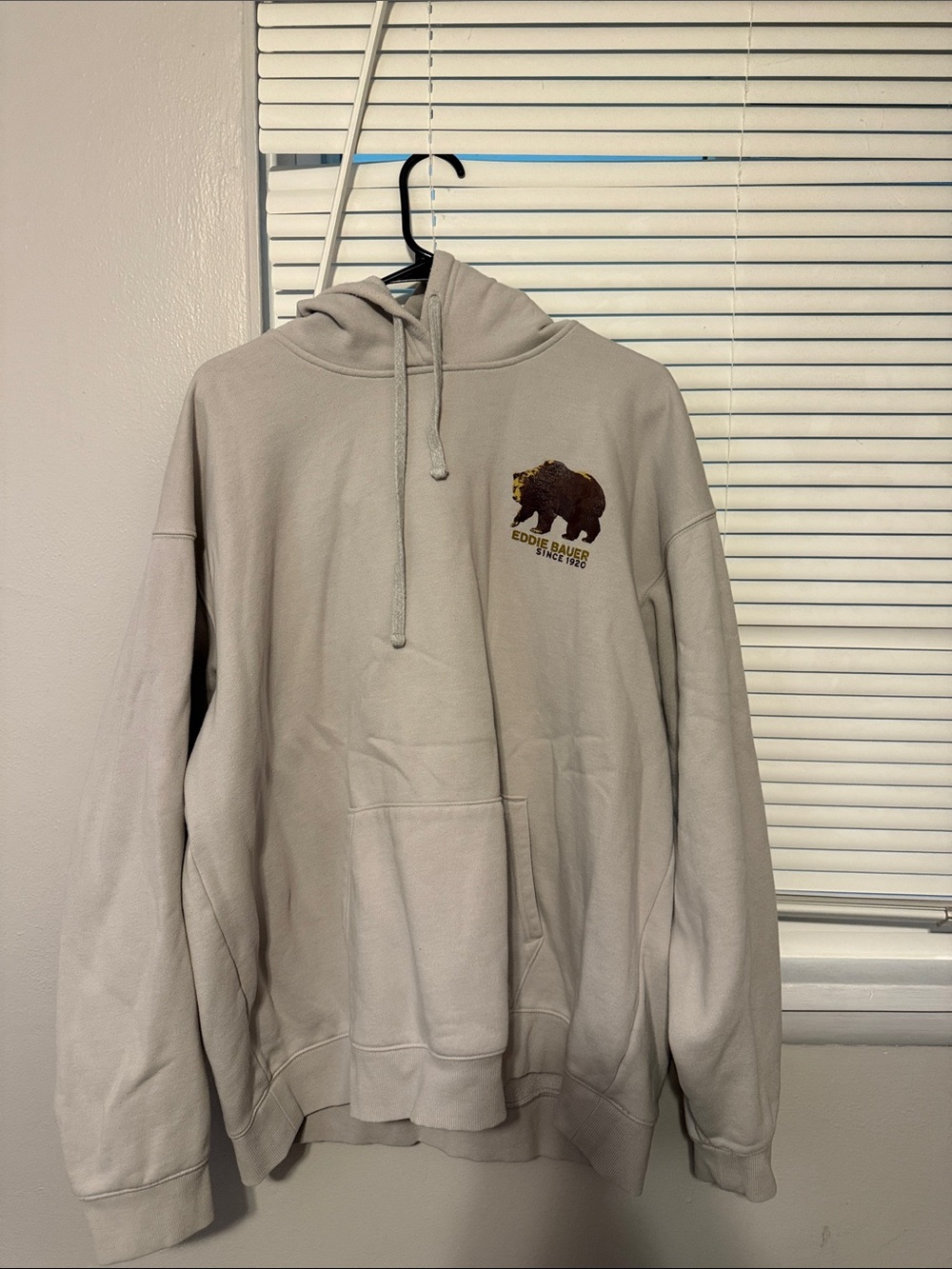 Eddie Bauer Men’s Light Cream Crewneck Hoodie with Brown Bear Logo